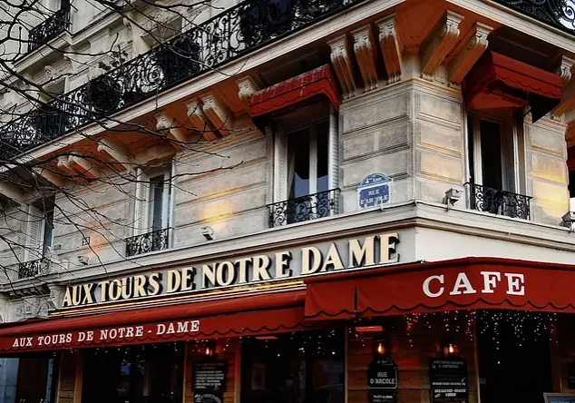 Parisian cafe near Notre Dame with red awning