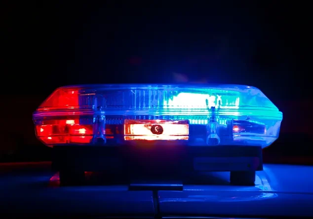 Flashing red and blue police emergency lights
