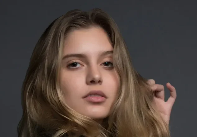 Close-up portrait of person with long hair